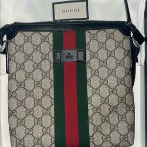 Gucci Messenger bag used but good condition comes with original box and dust bag